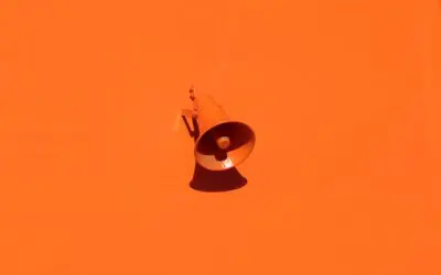 Megaphone on orange background