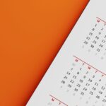 White Calendar On Orange Background