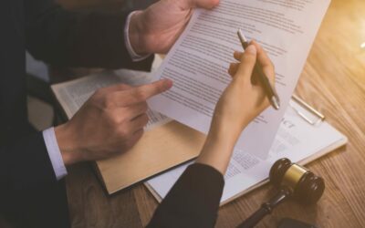 two people reviewing a legal document