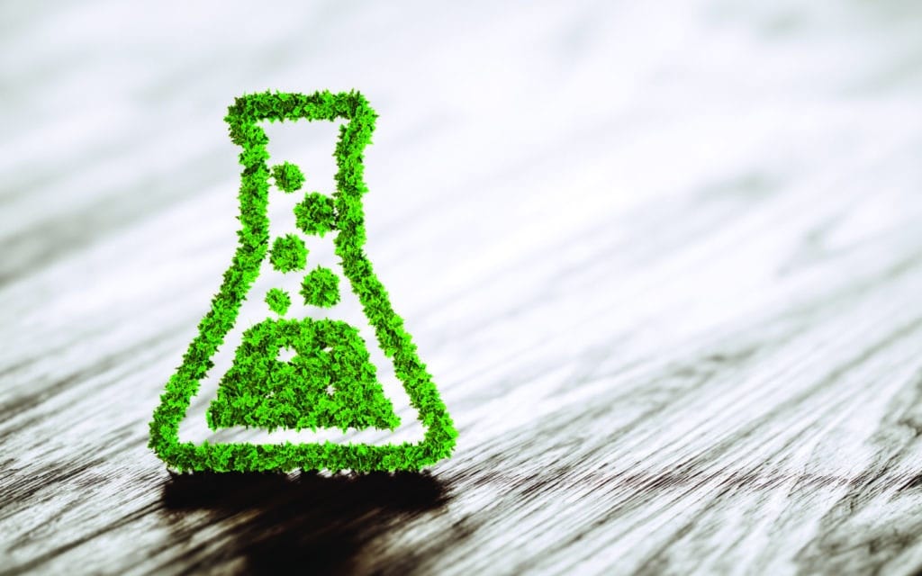 Green chemistry industry sign on black wooden background. 3D rendering.