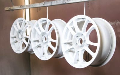 Process of powder coating auto wheels in workshop