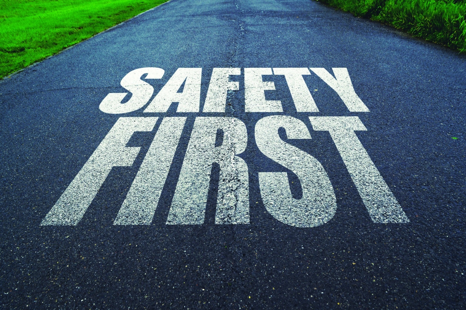 Safety first, message on the road. Concept of safe driving and preventing traffic accident.