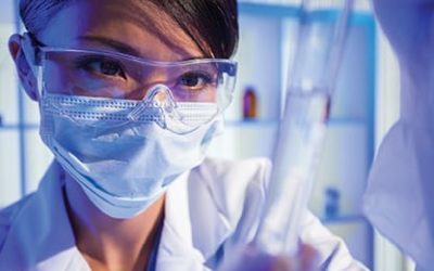 Chinese Female Woman Scientist With Test Tube In Laboratory