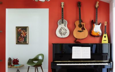 interior of a house with guitars hanging on the wall