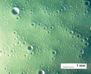 FIGURE 10—Pinhole gassing in an acrylic electrodeposition coating. 