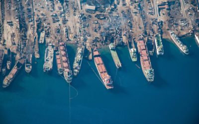 aerial view of a shipyard full of shipwrecks