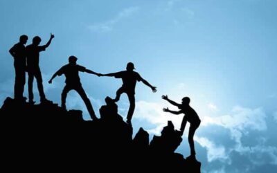 Group of people on mountain peak