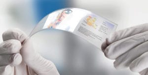 Scientist holding one piece transparent of graphene application