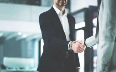 Closeup shot of two business people shaking hands in an office