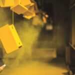 Spray paint color onto product