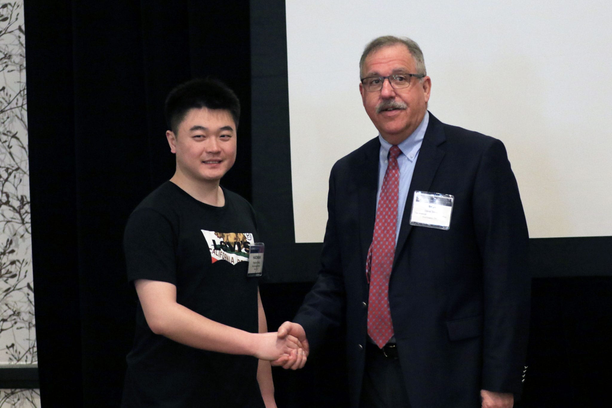 steve-shaking-hands Steve-Haoran-Wang
