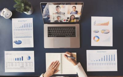 Young Asian businesswoman work at home and virtual video conference meeting with colleagues business people, online working, video call due to social distancing, top view