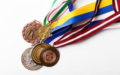 group of sport medals on white background