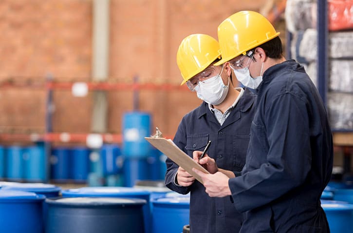 Workers working at a chemical plant