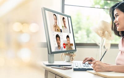 woman at computer in online meeting