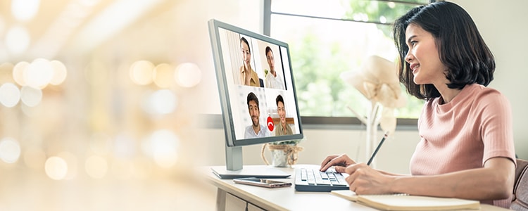 woman at computer in online meeting