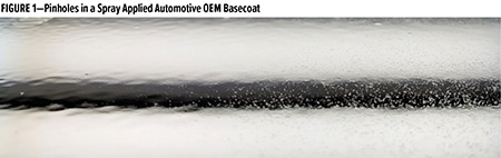 cured surface of a black, solvent-based, automotive OEM basecoat 