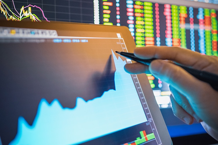 Businessman analysis stock chart in crisis covid-19