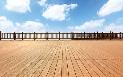 Lakeside wood floor platform and blue sky with white clouds
