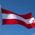 The Austrian flag waving in the wind.
