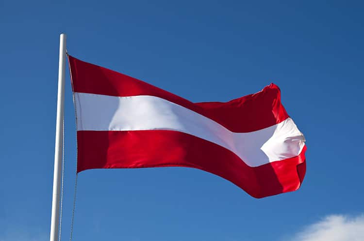 The Austrian flag waving in the wind.