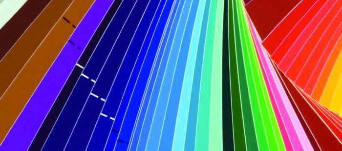 Fanned out paint sample cards.