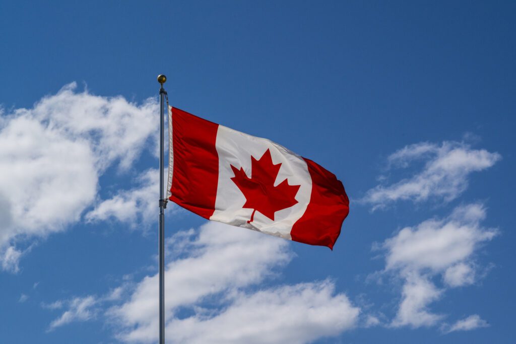 Canadian flag blowing in breeze